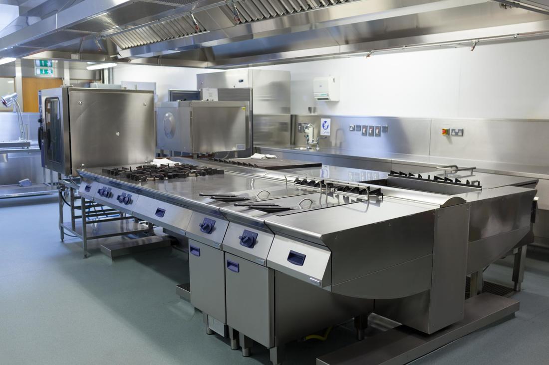 ​This is a picture of a commercial kitchen cleaning.