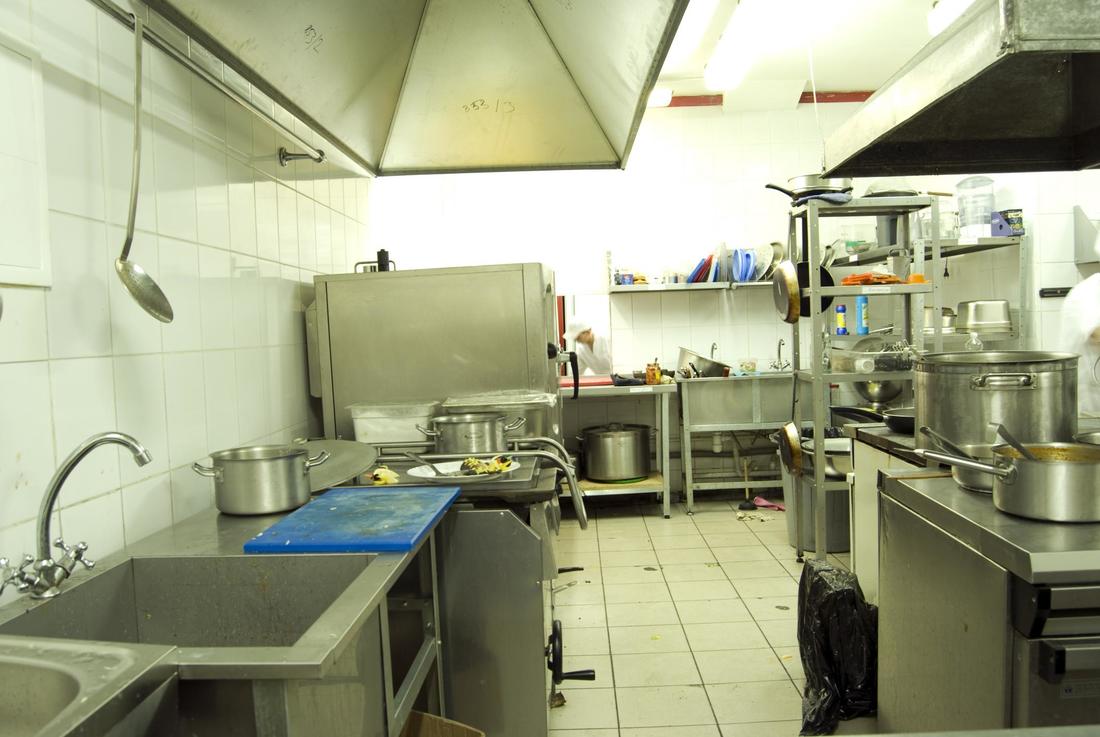 ​This is a picture of a commercial kitchen equipment cleaning.